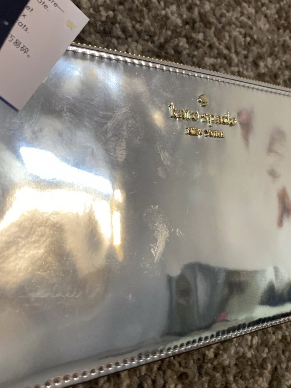 KATE SPADE * LUCY MIRROR METALLILC ZIP WRISTLET * 8" X 5" * SILVER * NWT - Picture 2 of 5